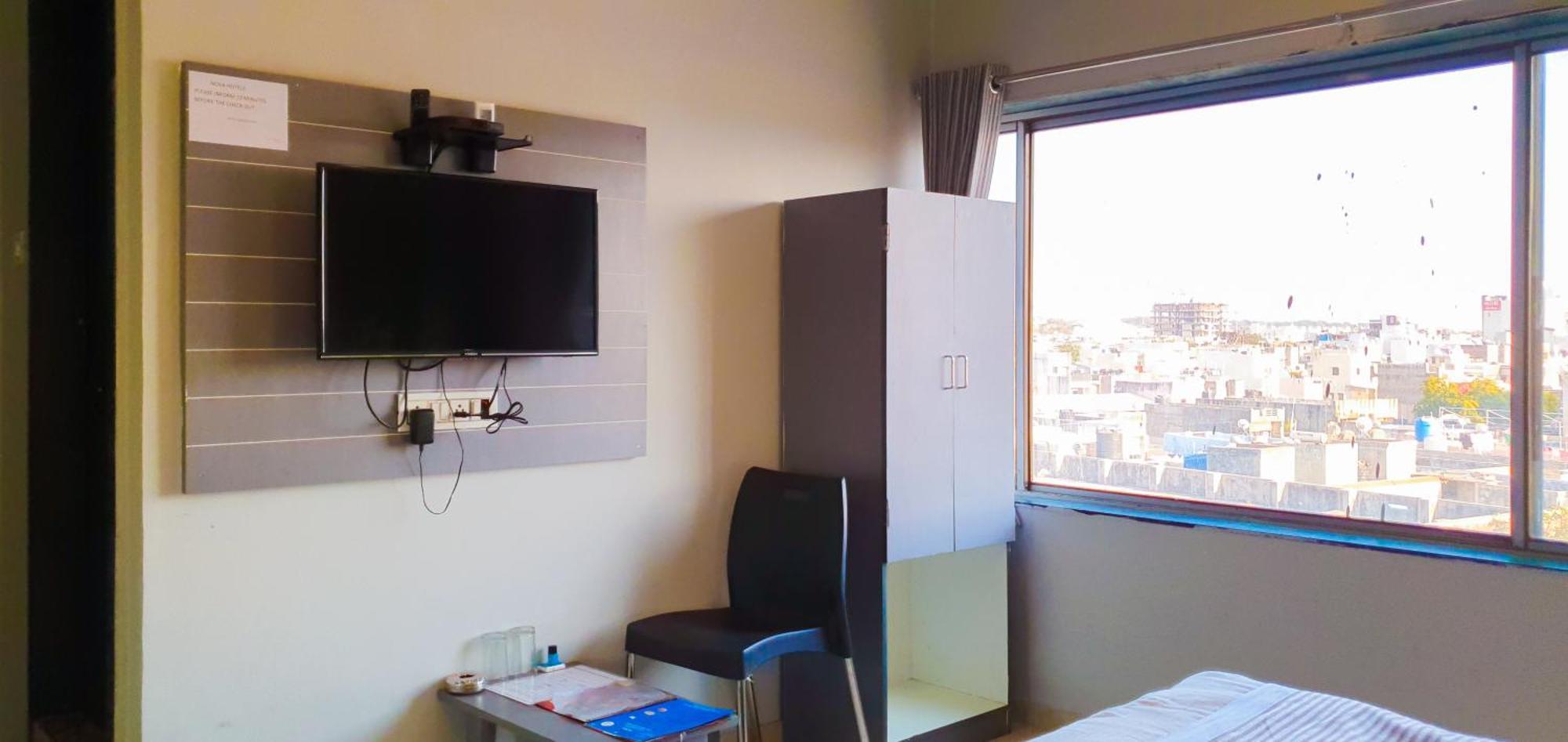 Nova Hotel New Crossroad Rajkot Esterno foto